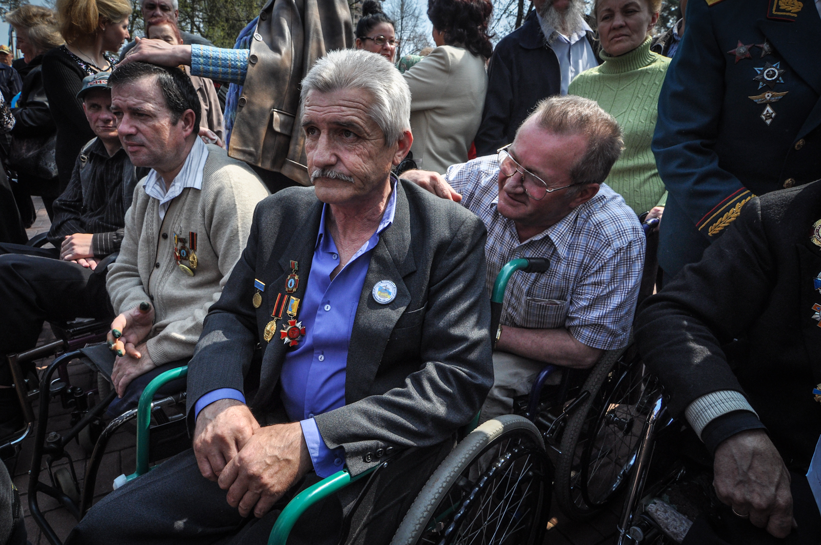 Disabled liquidators at a memorial to the Chernobyl disaster. Many feel abandoned by the State, receiving little or no compensation